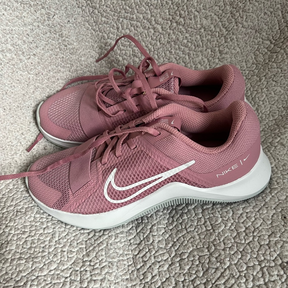 NWOT!!! Pink Nike exercise shoes. Perfect for wearing to the gym.